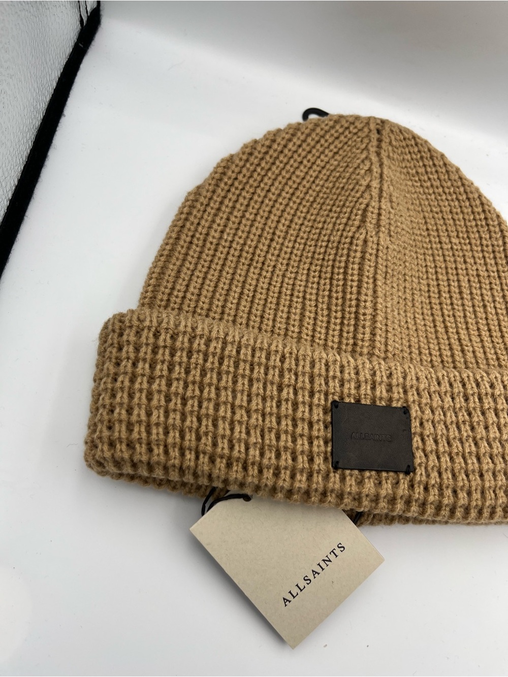 AllSaints Travelling Rib Beanie with a leather logo patch